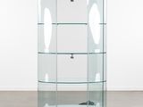 a glass display case with three shelves and a light bulb on top