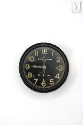 a clock that is on the wall with numbers on it
