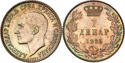 a close up of a coin with a crown on top of it