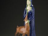 an image of a figurine of a woman and a dog