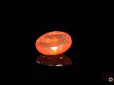 Une lampe Oplite orange s'allume dans l'obscurité