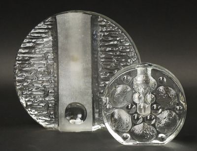 two pieces of glass sitting on top of each other