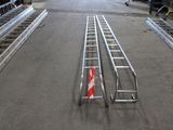 two ladders that are sitting in the middle of the road