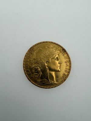 an image of a gold coin with a woman ' s face on it