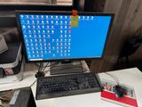 a desktop computer sitting on top of a desk