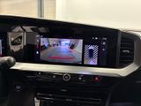the interior of a car with a camera mounted on the dash