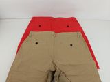 the children ' s shorts are tan and red with buttons on the side