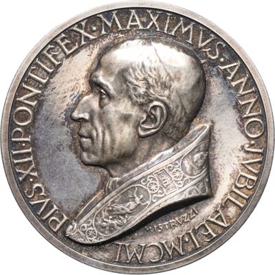 une image représentant une médaille d'argent sur laquelle figure le visage d'un homme