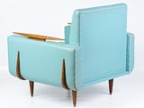 blue leather chair with wooden legs and armrests on a white background