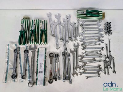 a lot of tools that are laying out on the table