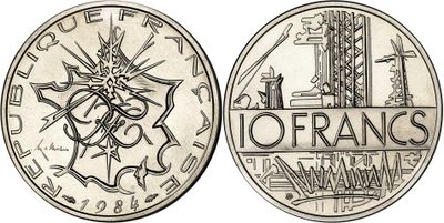 a close up of a coin with a picture of a building on it