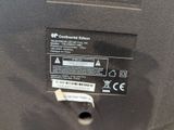 a close up of a label on the back of a suitcase