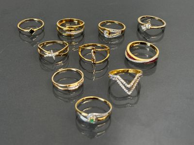 a lot of rings that are sitting on a table