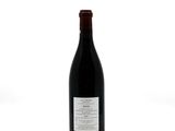 a bottle of wine that is sitting on a table