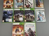 a bunch of video games are sitting on a table
