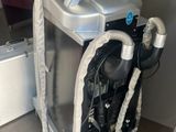 a machine that is sitting in the corner of a room