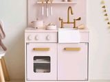 an image of a kid ' s play kitchen with a sink and stove
