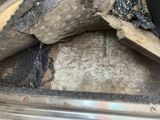 a close up of a piece of wood in the back of a car