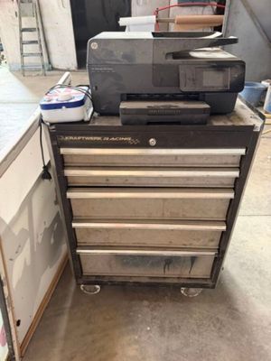 an image of a workbench with a printer on top of it