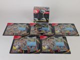 un lot de six cartes Pokémon empilées les unes sur les autres