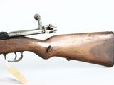 an old wooden rifle with a gun on a white background