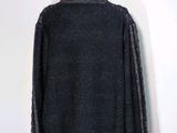 the back of a black sweater on a mannequin mannequin mannequin mannequin mannequin mannequin mannequin mannequin