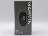 a close up of a box of a garmin watch on a white surface