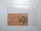 l'image d'une femme figurant sur le recto d'un billet de banque