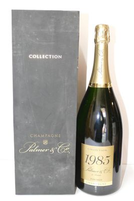 an image of a bottle of champagne next to a box