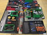 many different tools and tools laid out on a table