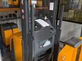 a forklift that is parked in a garage