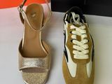 gold and white shoes with a box and a box of shoes