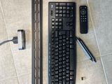 a keyboard and a mouse on the floor next to each other