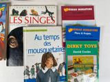 many children ' s books on the table together