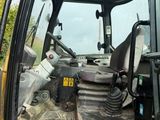 an image of a backhoe of a construction vehicle