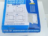 a box of tape on a table with a piece of paper on it