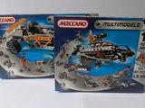 two boxed boxes of legos with a helicopter and a boat in them