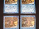 quatre cartes d'un jeu de cartes représentant un bébé dans un berceau