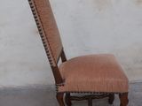 a brown chair with a brown seat and a brown back