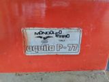 a close up of a sign on the side of a red box