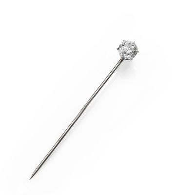 a single diamond on a stick on a white background