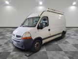 a white van that is parked in a room