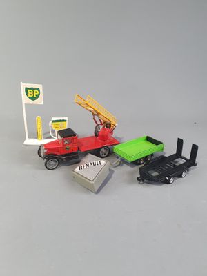 a small toy truck with a crane on top of it