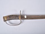a picture of a very old looking sword on a white surface
