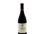 a bottle of wine that is sitting on a table