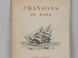 un livre sur lequel figure le dessin d'un bateau dans l'eau