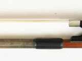 a close up of a pipe on a white surface with a white background