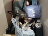 a pile of items in a box that is in a room