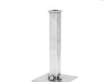 a metal pole that is standing on a white surface