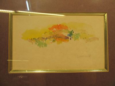a picture of a painting on display in a glass case